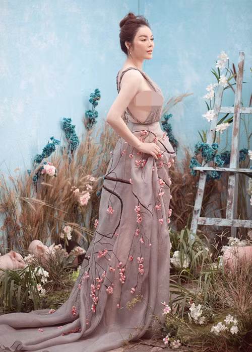 Năm 2012, Lý Nhã Kỳ cũng tiết lộ bạn trai rất trẻ, tài cao, có chí hướng lớn và hiểu cô. 4 năm sau đó, người đẹp khoe bạn trai luôn cưng chiều cô, cả hai cũng chưa từng giận nhau. Ảnh: Người tiêu dung