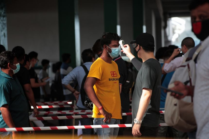 Singapore là một trong những quốc gia bắt đầu sống chung với COVID-19. Kể từ ngày 19/8, các doanh nghiệp ở quốc gia này sẽ cho 50% nhân viên quay lại văn phòng.