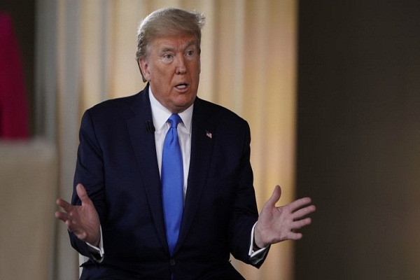 Tong thong Trump bat ngo noi thoi diem co vac-xin phong COVID-19