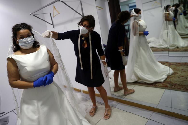 Dai dich COVID-19: The gioi ra sao sau khi noi phong toa?-Hinh-7