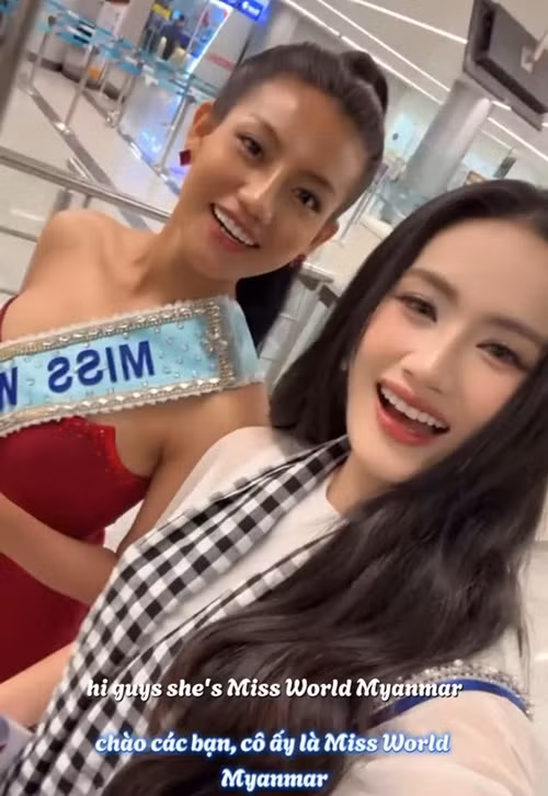 Đại diện Việt Nam giới thiệu đại diện Myanmar khi vừa nhập cuộc. Cả hai chạm mặt ở sân bay. Ảnh: Instagram Ý Nhi.