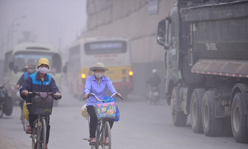 Canh bao suong mu quang hoa dang 'bua vay' Ha Noi va Sai Gon