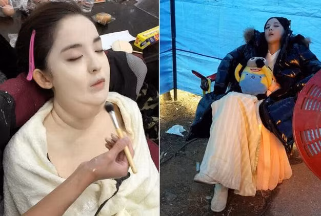 Cổ Lực Na Trát ngủ gật khi chuyên gia trang điểm đang hóa trang cho cô ở trường quay.