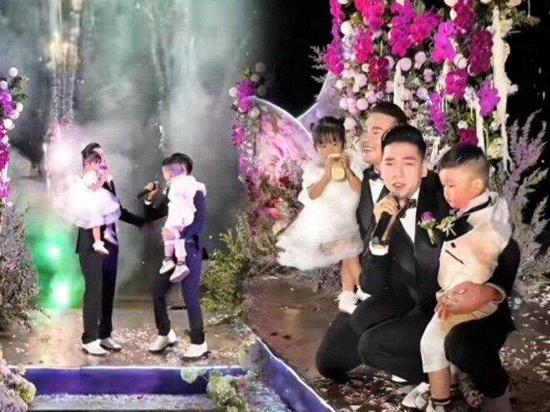 Hà Trí Quang và Thanh Đoàn đưa cặp song sinh lên sân khấu đám cưới. Ảnh: Người Đưa Tin.