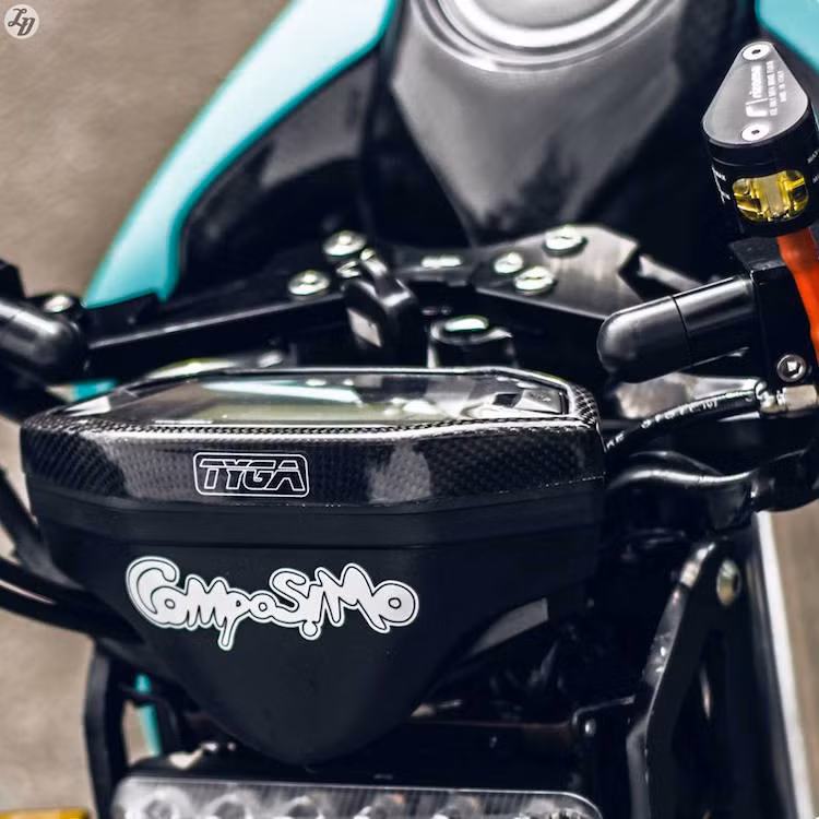  Đồng hồ điện tử của MSX được giữ nguyên, chỉ có ốp viền làm từ sợi carbon của hãng TYGA.