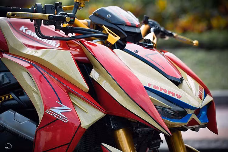 Chiếc Kawasaki Z1000 phong cách người sắt với hai màu đỏ - vàng này còn được chủ nhân ghi dấu ấn của riêng mình lên phần đầu xe. 
