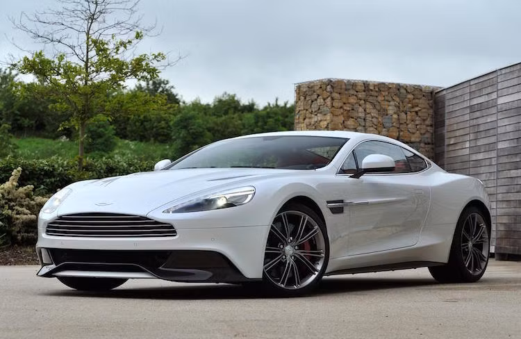 Được sản xuất từ 2001-2007, thế hệ Vanquish đầu tiên nổi tiếng với vai trò là xe của điệp viên James Bond trong phần phim Die Another Day. Tuy nhiên phải tới năm 2012, Vanquish thế hệ II mới được ra mắt để thay thế cho DBS trước đó.