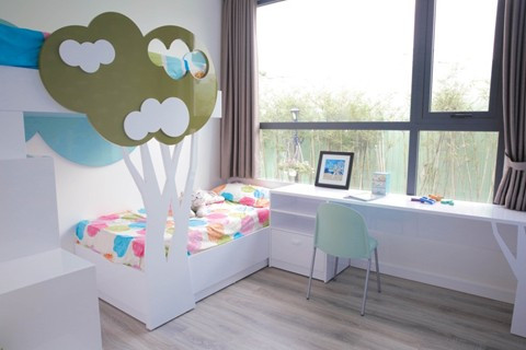 Phòng ngủ trẻ con được thiết kếm trang trí sinh động và ngập tràn ánh sáng.