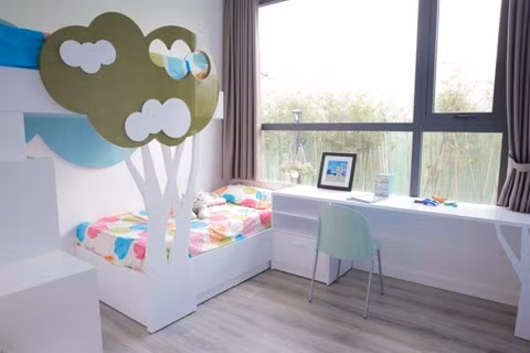 Phòng ngủ trẻ con được thiết kếm trang trí sinh động và ngập tràn ánh sáng.