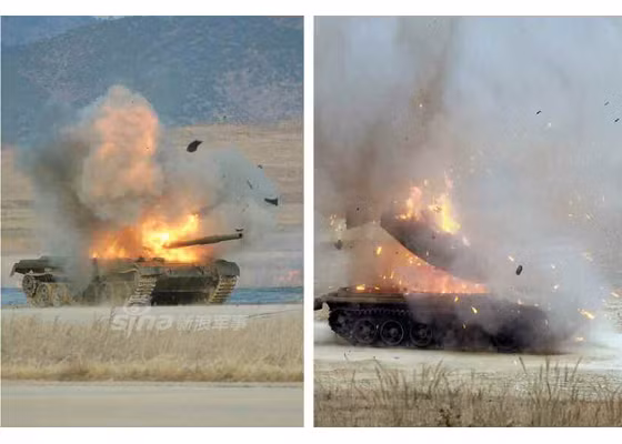 Khoảnh khắc xe tăng mục tiêu loại T-62 bị trúng đạn tên lửa mới của Triều Tiên. Phần tháp pháo bị bay luôn khỏi thân chứng tỏ uy lực tấn công mạnh khủng khiếp của loại tên lửa này.