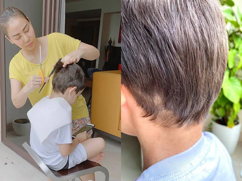 Thu Minh cắt tóc cho con trai tại nhà. Cô cũng thừa nhận thành quả không hoàn hảo, một mảng tóc ở phía dưới gáy của cậu bé bị cắt mất vì 'người thợ không chuyên'.