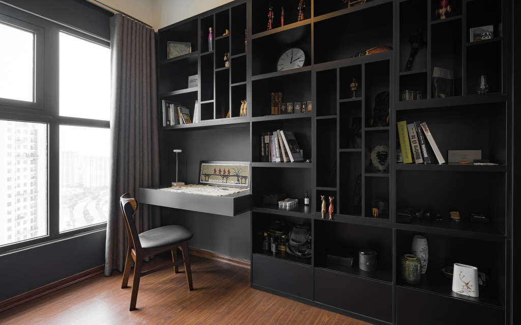 Tủ âm tường được sử dụng để sắp xếp đồ dùng một cách gọn gàng và còn tận dụng được hướng gió cũng như ánh sáng tự nhiên ở góc làm việc.