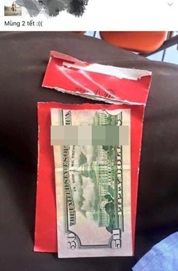 Cách xé lì xì kiểu "điệu nghệ" đã khiến chủ nhân của bức ảnh trên một cảm giác vô cùng cay đắng.