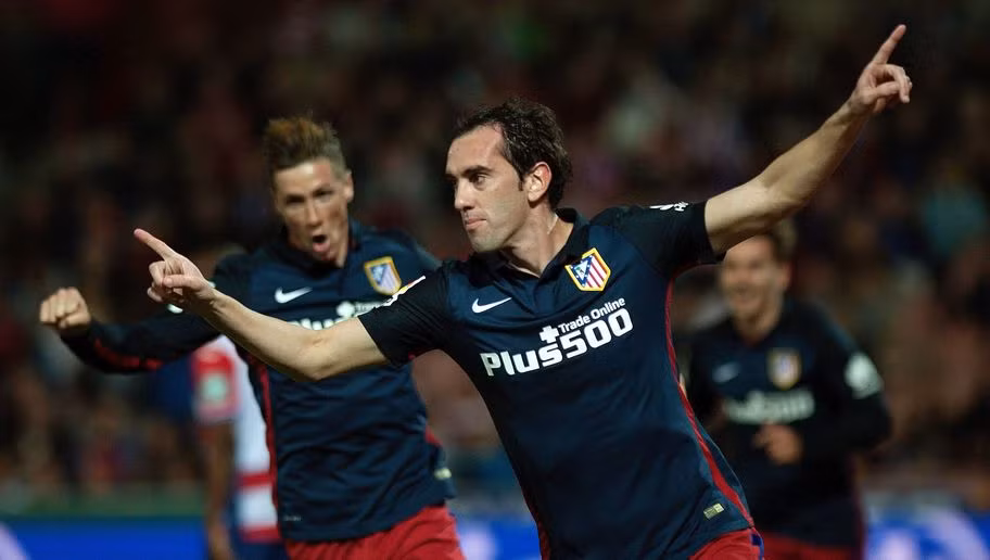 Godin chính là trung vệ đội trưởng của CLB Atletico Madrid, nhiều người cho rằng cầu thủ này mới chính là trung vệ hay nhất thế giới ở thời điểm hiện tại. Godin giúp cho Atletico Madrid giành vị trí thứ ba tại La Liga mùa trước với việc chỉ để thủng lưới có 29 bàn thắng.