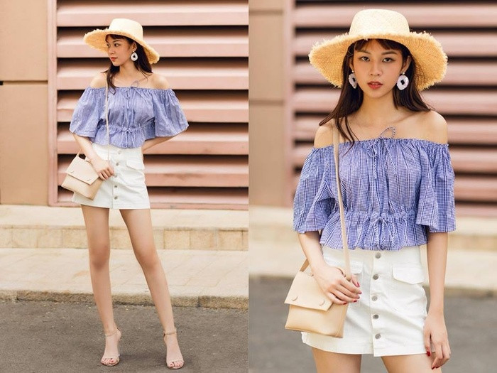 Phí Phương Anh xuống phố với những kiểu áo trễ vai điệu đà.