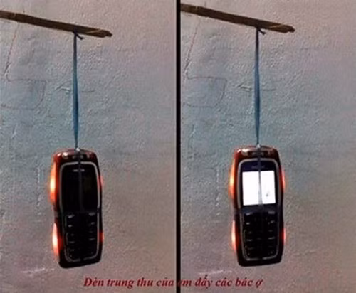 Ngoài tác dụng nghe và gọi, chiếc điện thoại cũng có tác dụng khác trong mùa Trung thu. Ảnh: Sưu tầm Facebook.