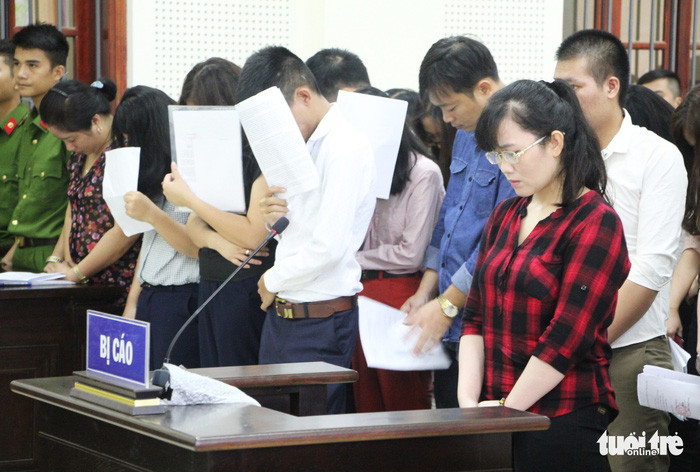 Bị cáo Nguyễn Thị Lam nghe tòa tuyên án tù chung thân chiều 16-7 - Ảnh: DOÃN HÒA