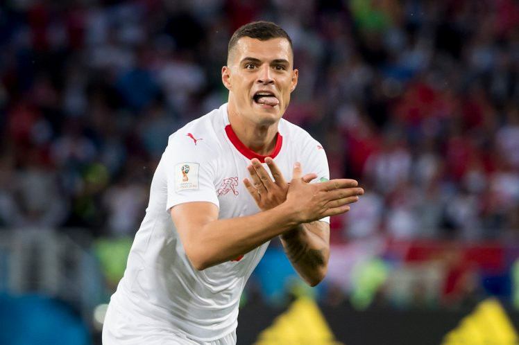 Sau trận, Xhaka đăng tấm ảnh lên mạng xã hội, kèm theo chú thích tiếng Albania: “Hãy trông đây Serbia, đó là lý do vì sao người ta gọi tôi là Granit Kosovo”. Sau đó, Xhaka xóa bài đăng và thay thế tấm ảnh khác, kèm theo dòng chữ: “Chúng tôi đã làm điều đó, người anh em”, viết bằng tiếng Anh.