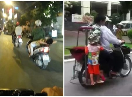 Ảnh cắt từ clip ghi lại cảnh đèo con vô cùng nguy hiểm của các phụ huynh Việt. Điều gì sẽ xảy ra nếu xe vô tình va chạm hoặc gặp chướng ngại vật?