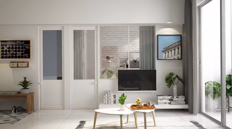 Tivi treo tường, bàn tam giác lồng vào nhau giúp tiết kiệm diện tích.