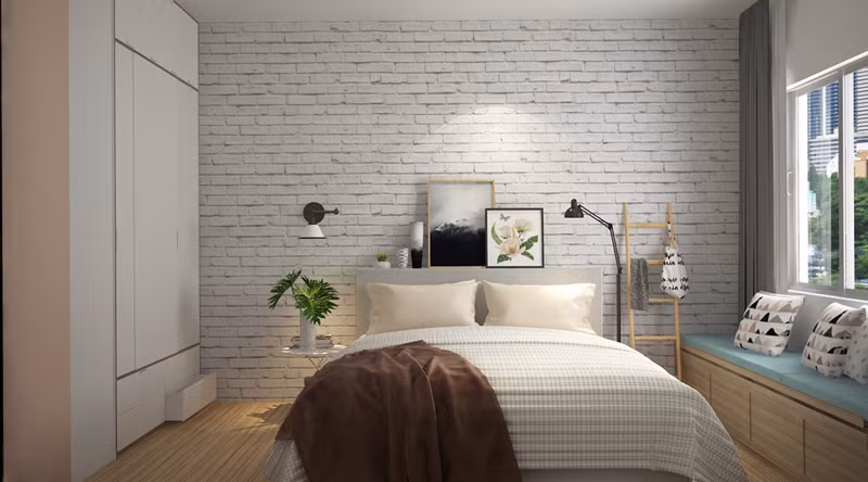 Đệm sofa màu xanh làm điểm nhấn trong phòng ngủ.