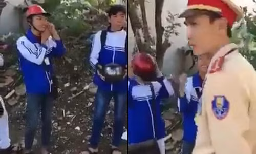A Day Roi: CSGT phat hoc sinh khong doi mu bao hiem cuc de thuong