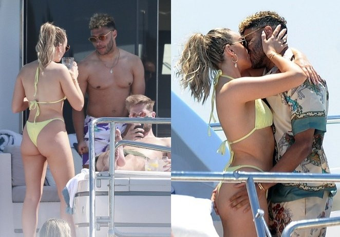 Alex Oxlade-Chamberlain đảm bảo đang ăn mừng chiến thắng của Liverpool bằng hành động khá nhạy cảm khi chạm vào mông của bạn gái.