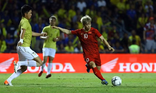 Anh Duc no sung, DTQG Viet Nam khien Thai Lan om han o phut cuoi-Hinh-35