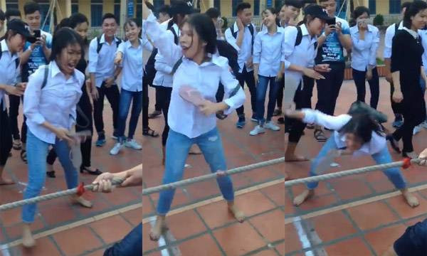 Dù không trực tiếp thi kéo co nhưng cô gái này lại gây chú ý bằng việc cổ vũ hết sức sung.