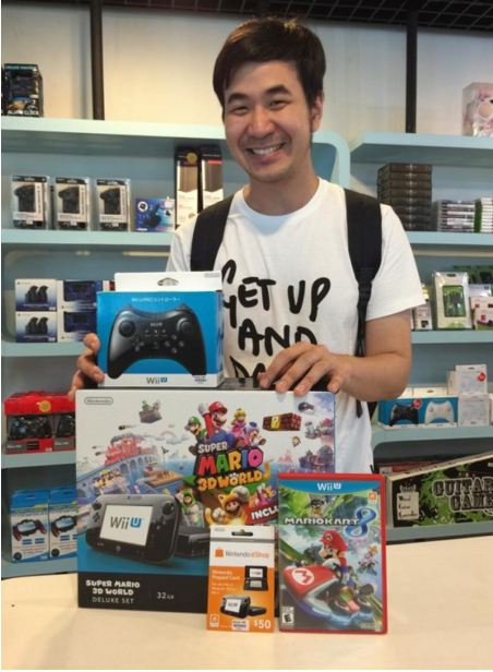 Anh chàng chú rể đã cất công đi mua máy chơi game để phục vụ cho lễ cưới có 1-0-2 của mình.