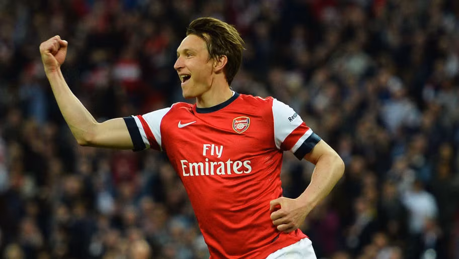 Kim Kallstrom về với sân Emirates vào tháng 1/2014, tuy nhiên chấn thương mãi đến tháng 3 cầu thủ người Thụy Điển này mới ra mắt các CĐV Arsenal. Ghi bàn trong loạt đá phạt đền ở bán kết với Wigan, đưa Arsenal vào chung kết FA Cup năm đó có lẽ là dấu ấn duy nhất.