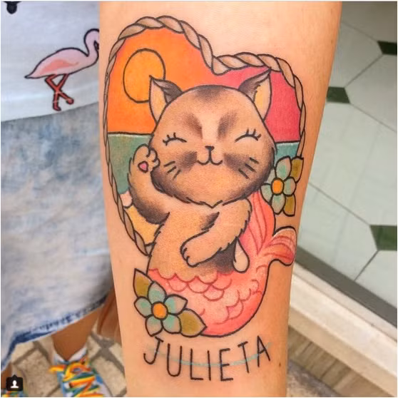 Hình xăm biến tấu "Mèo tiên cá". Ảnh: Instagram.