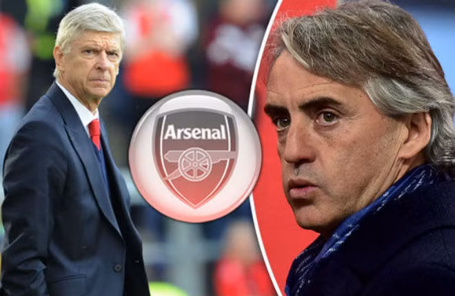 Mancini thay thế Wenger?: Theo thông tin chuyển nhượng bóng đá mới nhất từ báo chí Anh, Arsenal đang khởi đầu mùa giải quá tệ với 2/3 trận thua. Không những vậy, HLV Wenger còn không quản lý được phòng thay đồ. Khả năng "Giáo sư" bị sa thải ngày càng tăng mạnh khi mới đây nhiều tờ báo Anh tiết lộ BLĐ Arsenal đang bí mật đàm phán với Roberto Mancini, chiến lược gia đã từng giúp Man City vô địch Premier League. Ảnh: Mirror