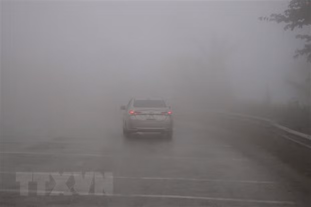 Khu vuc Bac Bo co mua nho, mua phun kem suong mu ngay 26/1