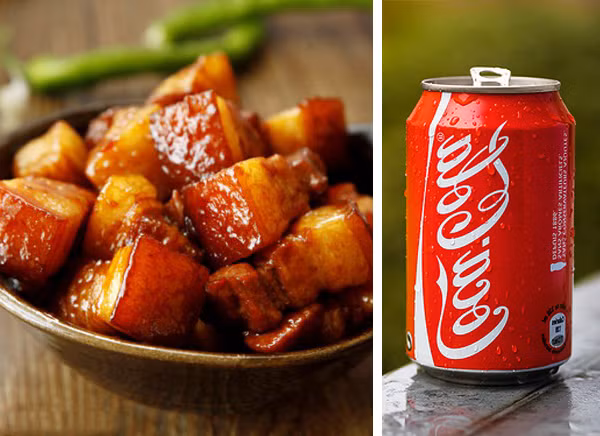 2. Thịt ba chỉ kho Coca Cola. Nguyên liệu: Thịt ba chỉ, dầu điều, hoa hồi, hành tím, hạt nêm, tiêu, dầu ăn, coca cola, tỏi, thanh quế, hành lá, đường trắng, nước mắm, ớt. Thịt ba chỉ rửa sạch, cắt miếng vuông cỡ 2 đốt ngón tay. Tỏi và hành tím băm nhỏ. Ướp thịt với hạt nêm, tiêu, tỏi băm, hành tím băm, hành lá cắt khúc, nước mắm và dầu điều. Ảnh: tin8.com.