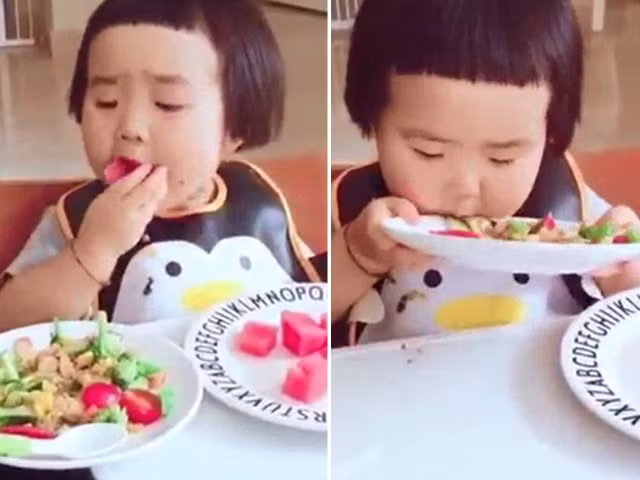 6. Bé ăn như kiểu: "Cả thế giới này chỉ có mình em" vậy. Ảnh: baophunuonline.info.