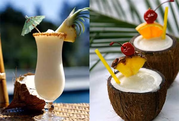 6. Cocktai dừa. Nguyên liệu: Rượu VeeV Acai Spirit, nước dừa, chanh, chanh dây, đá bào. Chuẩn bị hai cái cốc rồi đổ rượu vào một cốc và nước dừa vào một cốc. Nghiền đá nhỏ rồi đổ đều vào hai cốc nhé. Sau đó vắt chanh, chanh dây vào mỗi cốc rồi đổ hai cốc vào với nhau để tạo thành ly cocktail dừa mát lạnh nhé. Ảnh: dulichtaubien.net.