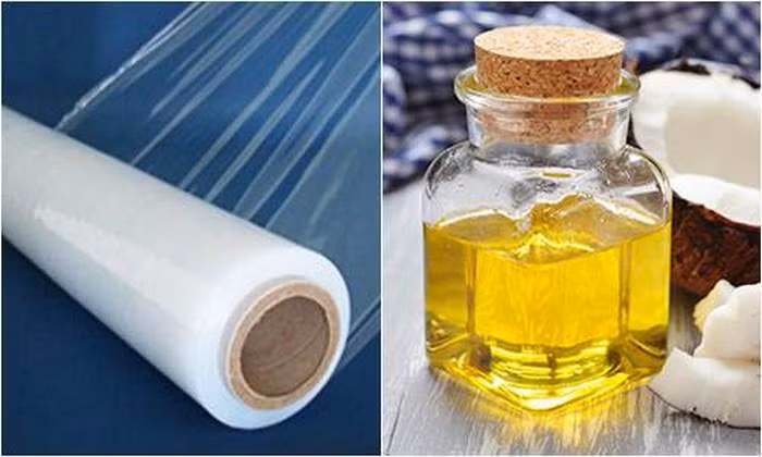 Màng bọc thực phẩm quấn dầu dừa. Nếu bạn muốn giảm mỡ vùng nào thì hãy quấn vùng đó. Đầu tiên, vệ sinh sạch sẽ vùng cần giảm mỡ rồi massage nhẹ nhàng để máu lưu thông. Sau đó, thoa một lớp dầu dừa mỏng lên vùng da rồi massage nhẹ nhàng trong 1-3 phút. Ảnh: Tamsu.