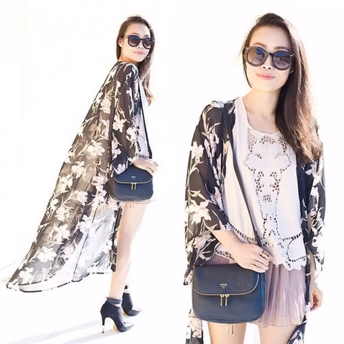 Vào những ngày nắng, bạn có thể chọn những chiếc áo mang phong cách kimono đi biển để khoác ngoài tạo thành phong cách layer, vừa chống nắng hiệu quả lại vừa cá tính. Ảnh: Vietgiaitri.
