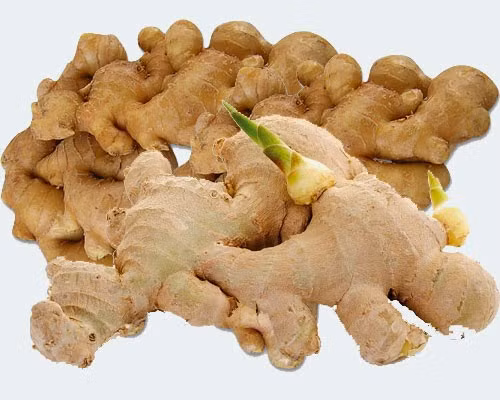 1. Gừng nướng. Trị đầy bụng, khó tiêu: Lấy một củ gừng nhỏ bằng ngón tay cái nướng lên rồi ăn chỉ nửa giờ sau sẽ không còn cảm giác này. Ảnh: salontoc.com.