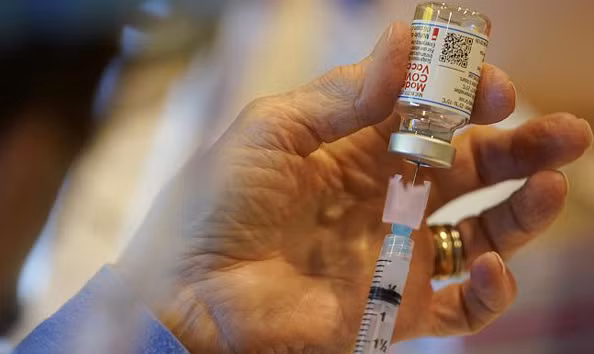 WHO cảnh báo không uống giảm đau, chống dị ứng trước tiêm vắc xin Covid-19 WHO canh bao khong uong giam dau, chong di ung truoc tiem vac xin Covid-19