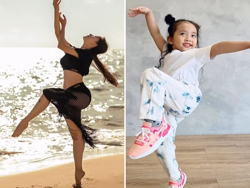 Bé Anna có kiểu tạo dáng gần giống mẹ.