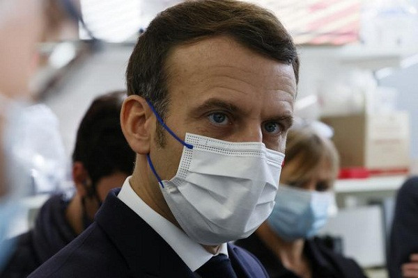 Đến 24/12, Financial Times đưa tin, Tổng thống Pháp Emmanuel Macron đã khỏi COVID-19 sau 8 ngày cách ly để điều trị bệnh. Ảnh: Reuters.