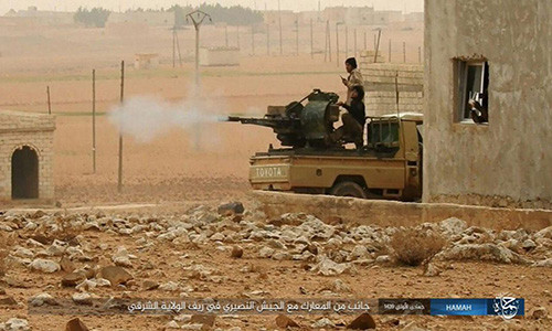 Theo Al Masdar News, phiến quân IS đã bất ngờ mở cuộc tấn công dữ dội nhằm vào các căn cứ của Quân đội Syria ở Đông Bắc Hama hôm 18/1. Ảnh: AMN.