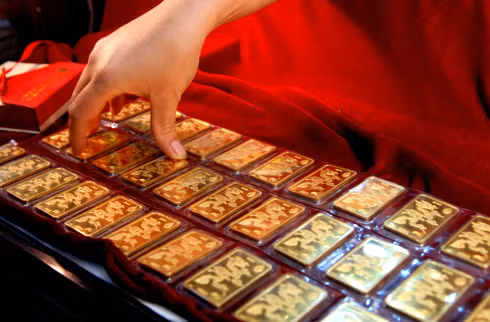 Cho phep nha may in tien quoc gia san xuat vang mieng