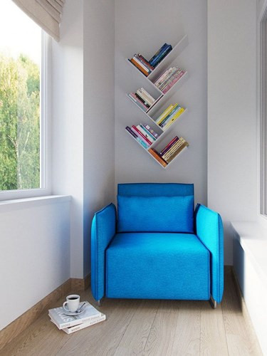 Những chiếc ghế được kê gần những khung cửa kính lớn, để tận dụng nguồn ánh sáng tự nhiên đọc sách hoặc nghỉ ngơi.