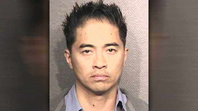 Trần Tiến Dũng bị cảnh sát bắt vì tội bạo hành vợ.