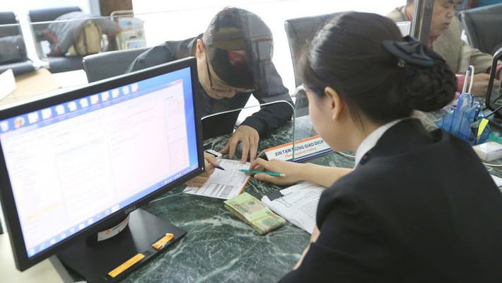 Quy mô vốn ngân hàng càng tăng, càng lớn đang và sẽ đặt ra áp lực tạo được lợi nhuận tương xứng trong khi khó đẩy cao tăng trưởng tín dụng - Ảnh: Quang Phúc.