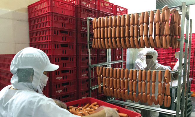 Thị trường xúc xích đang có góp mặt của các doanh nghiệp lớn. Ảnh: DNSG.