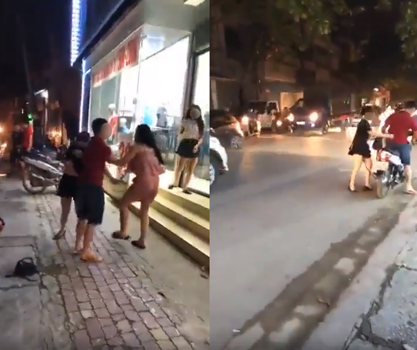 Sau khi bị vợ (áo hồng) phát hiện, cả anh chồng (áo đỏ) và cô nhân tình (áo đen) vội vã lên xe máy chạy trốn. Ảnh cắt từ clip.